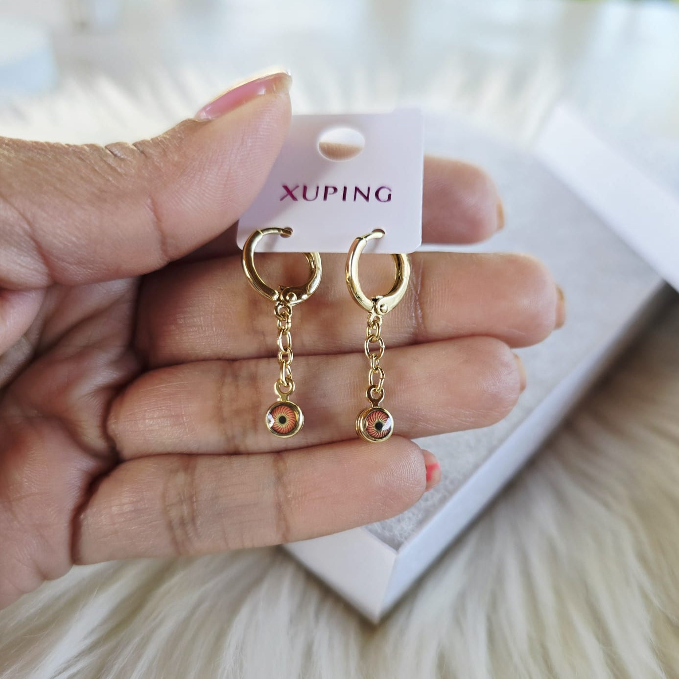Aretes Ojitos xp