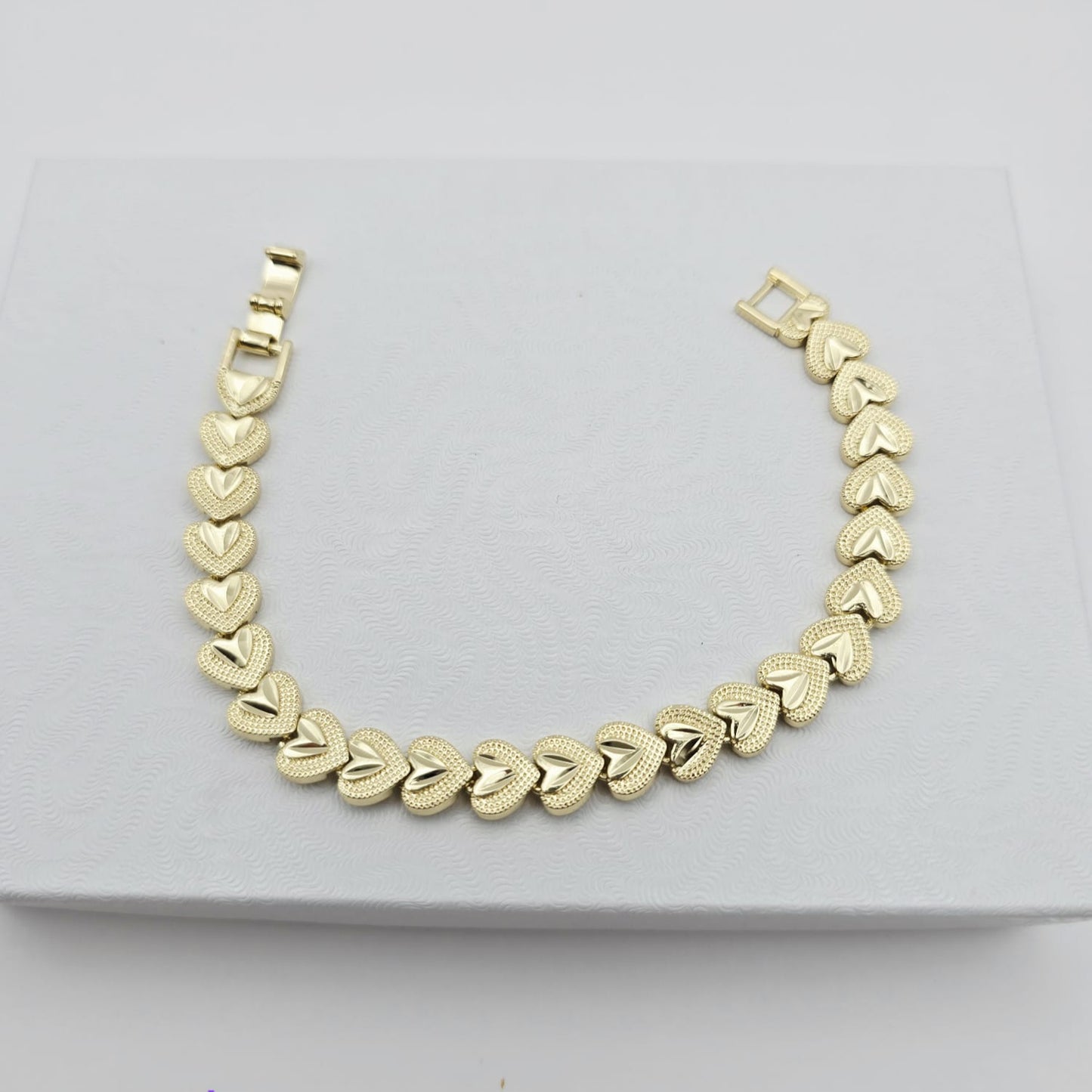 Pulsera Corazones Dorados 8.5N