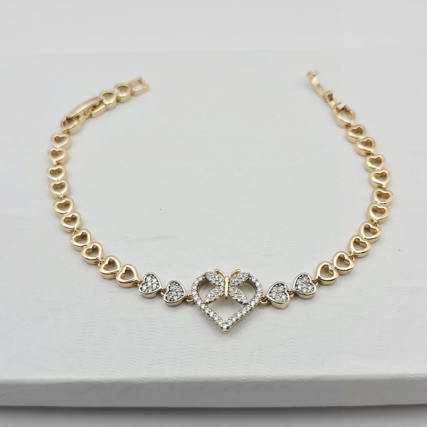 Pulsera Corazones y Mariposa 18k xp 17+2cm