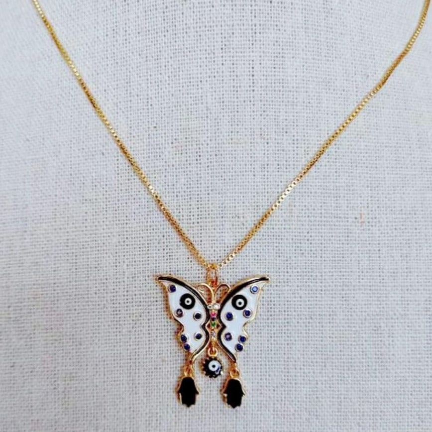 Dije con Cadena Mariposa Blanca con Negro y Ojitos