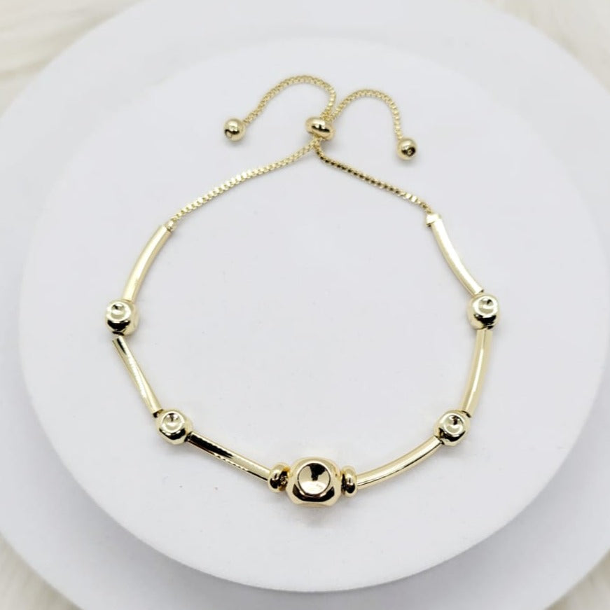 Pulsera Tubos Dorados Ajustable