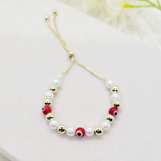 Pulsera Ajustable Perlas y Ojos Rojos